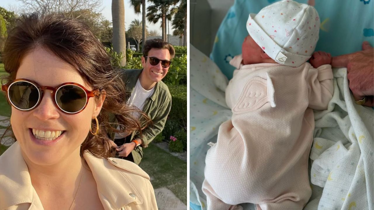 Smiling woman wearing round sunglasses takes a selfie outdoors; a man in a green jacket stands behind her in a sunny garden.